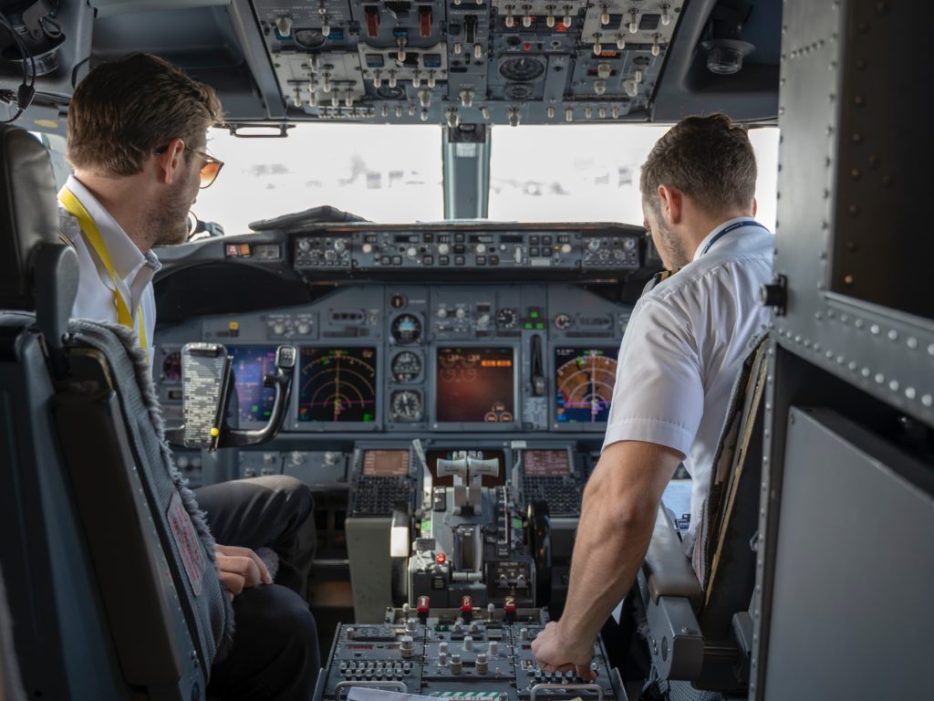 two pilots in a cockpit