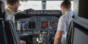 two pilots in a cockpit