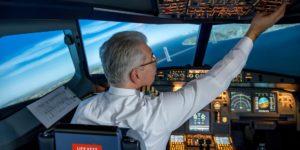 commercial airplane pilot in cockpit